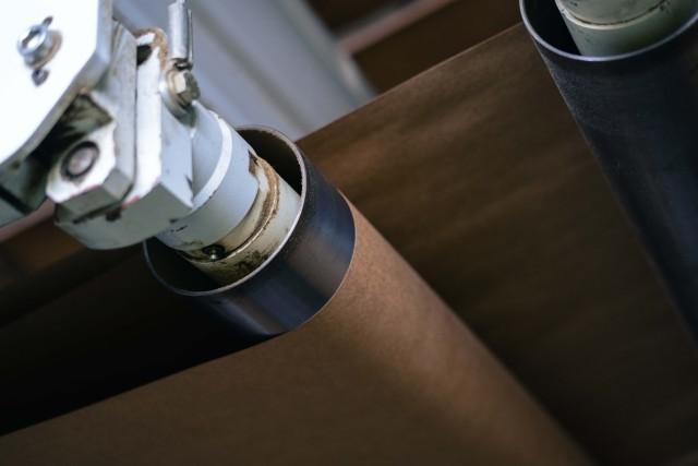 a close up of containerboard in a manufacturing process